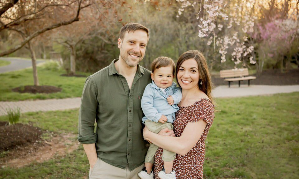 mom holding baby boy with dad