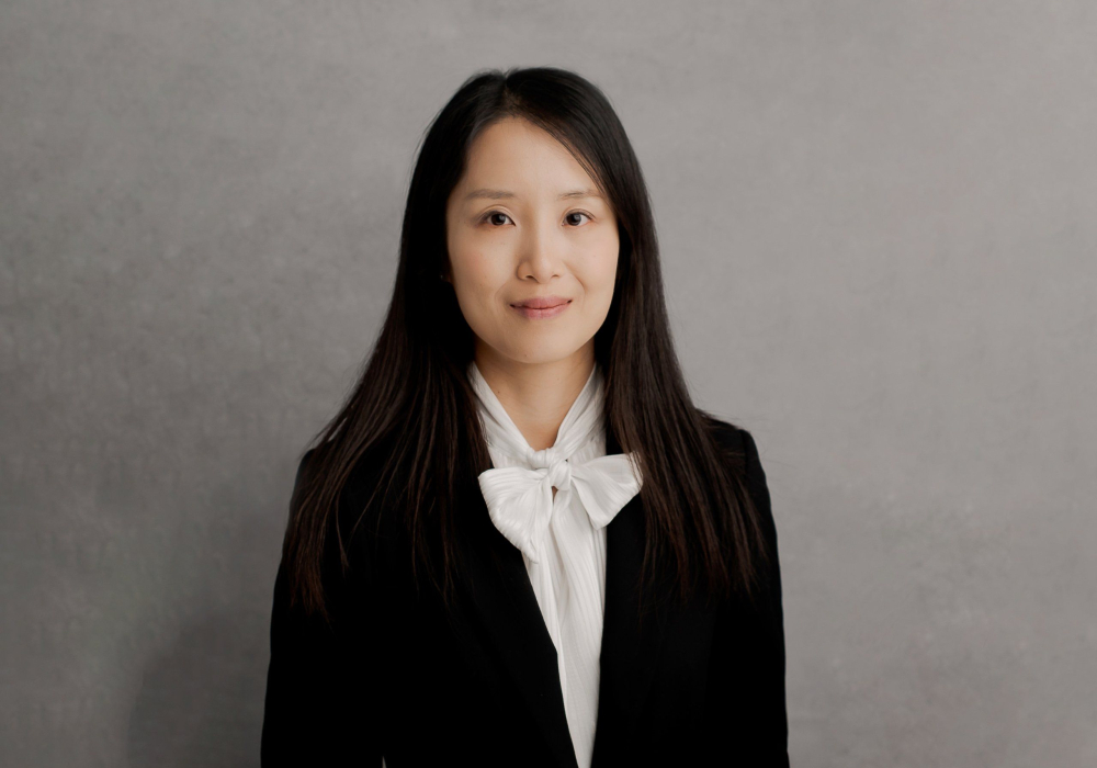 Professional headshot woman wearing black jacket with white blouse Lansdale
