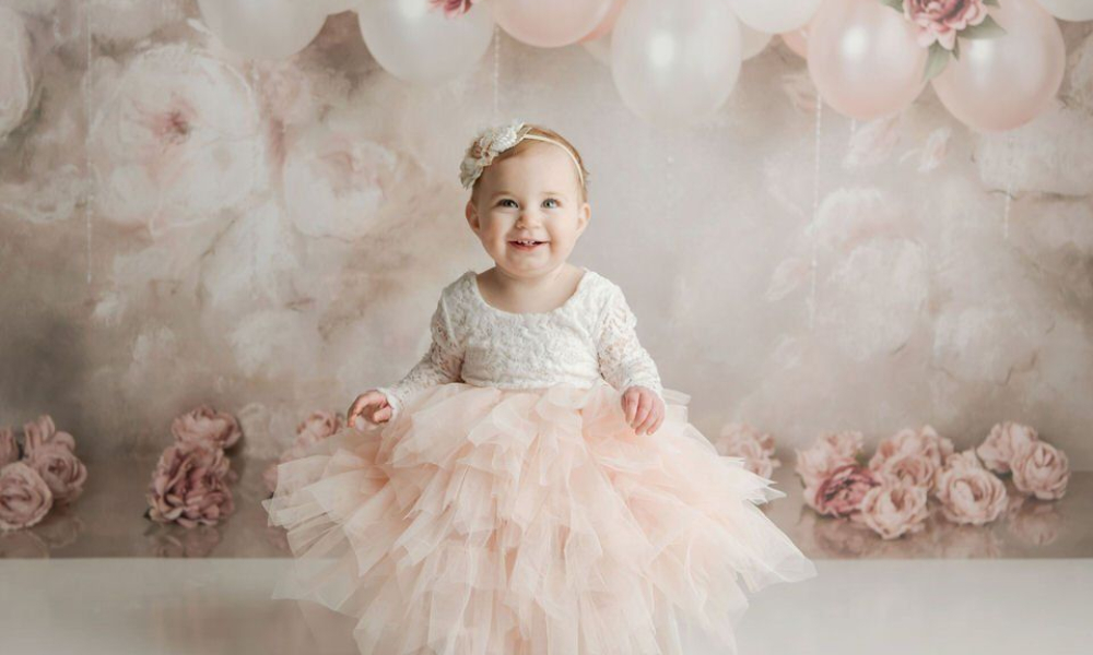 baby girl first birthday cake smash pink roses and balloons Lansdale