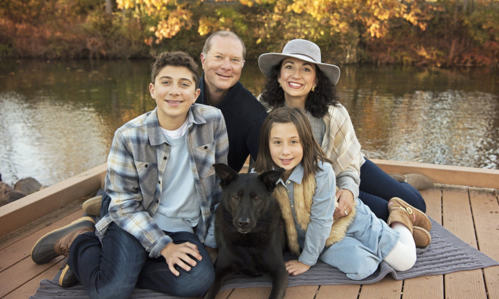Family with black dog