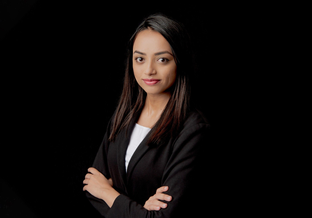 Professsional headshot woman wearing black suit jacket Lansdale