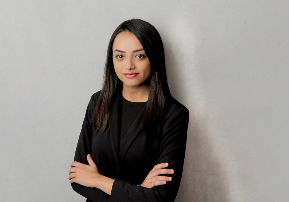 Professsional headshot woman wearing black suit jacket Lansdale