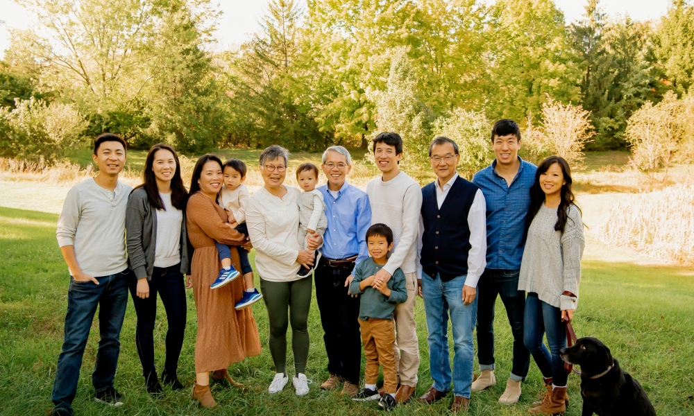 Extended family group picture at the park with dog Lower gynwedd