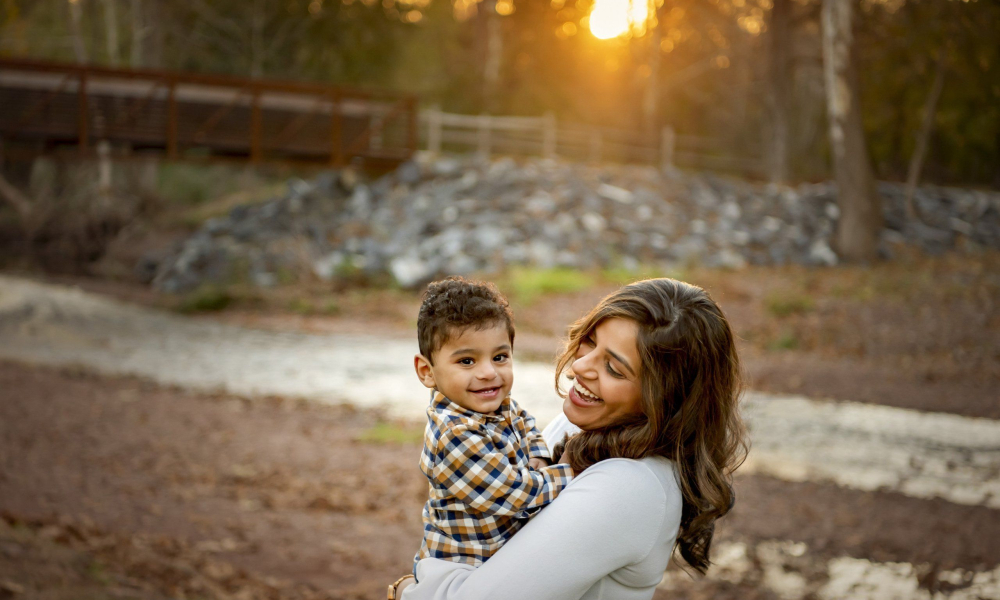 Mom hugging son at Fischers Park