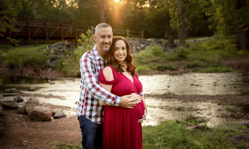 husband and pregnant wife at Fischers Park
